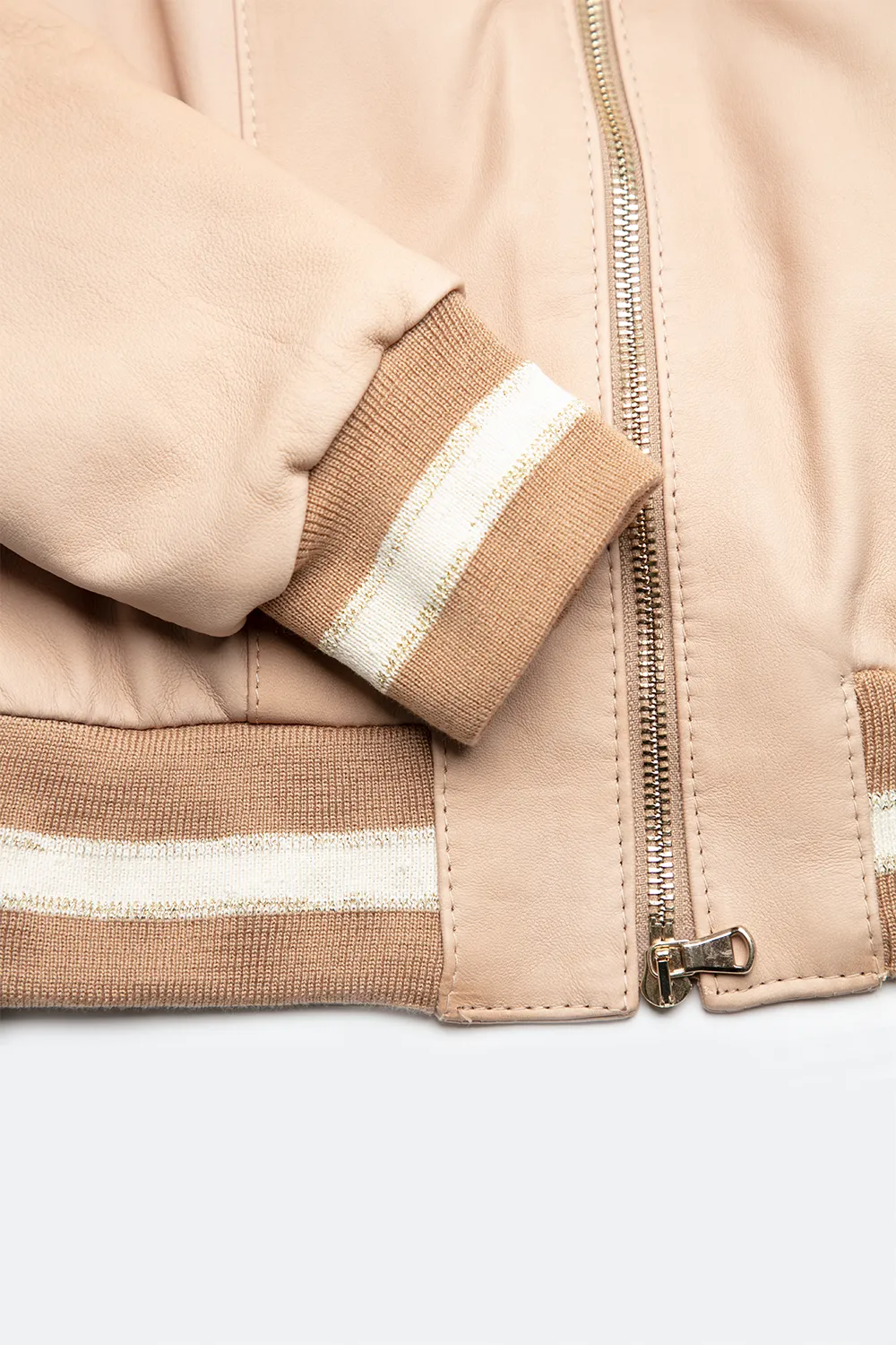 Beige leather bomber jacket in Ambra style.