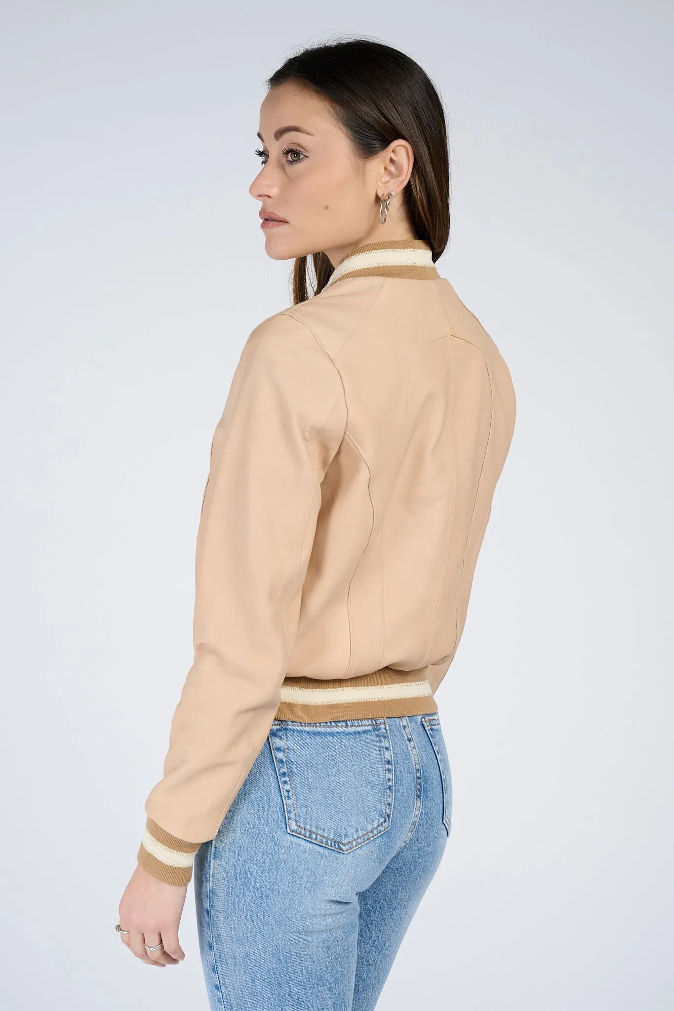 Beige leather bomber jacket in Ambra style.