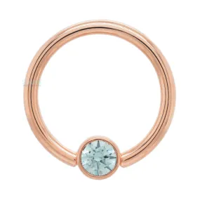 Captive Bead Ring (CBR) in Gold with Bezel-set Cyan CZ Captive Bead