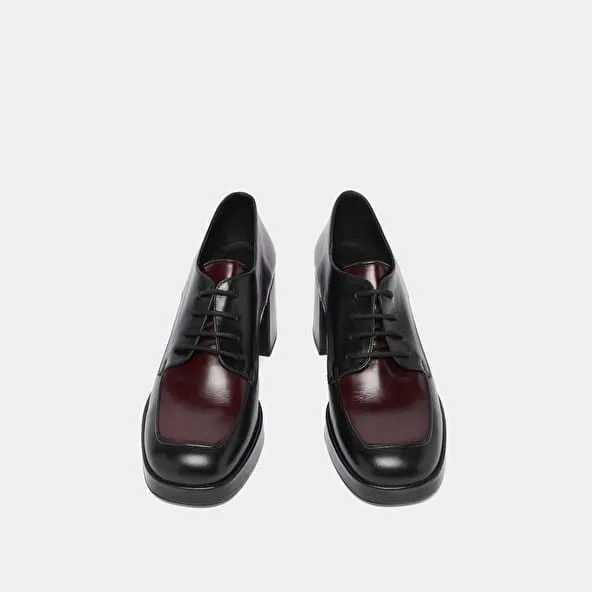 Derbies with heels in black and burgundy leather