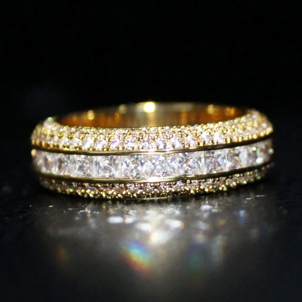 Princess Cut Channel Set Micro Pave CZ Eternity Band Ring in Gold